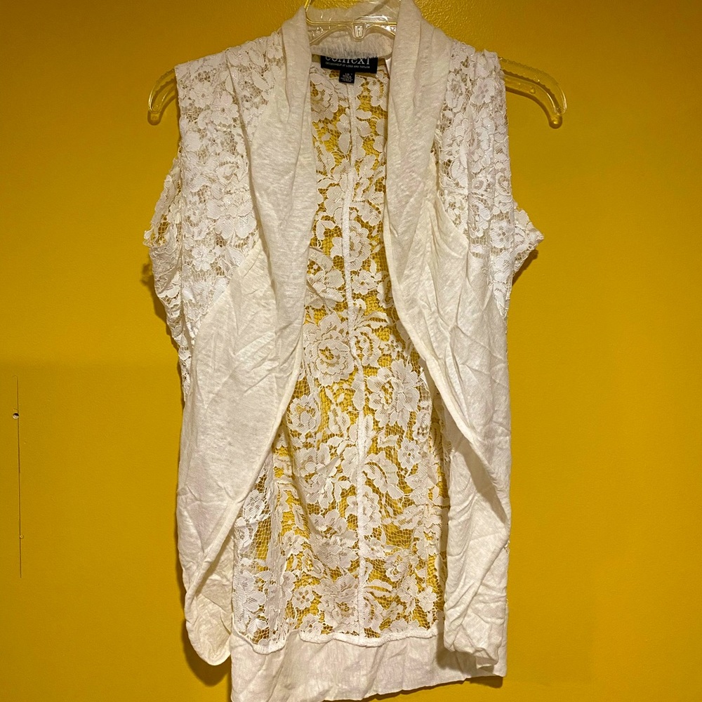 White cover-up top. A great addition to a simple blouse!